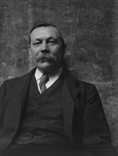 Doyle, Arthur Conan, Sir, portrait photograph, 1914 June 1. Creator: Arnold Genthe.