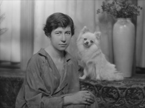 Stimson, Henry B., Mrs., with dog, portrait photograph, 1915. Creator: Arnold Genthe.