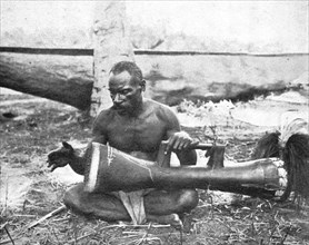 ''Indigene (Musicien) de la nouvelle-Guinee britannique; Les Terres Du Pacifique', 1914. Creator: Unknown.