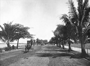 ''Une rue a Manille;Les Terres Du Pacifique', 1914. Creator: Unknown.