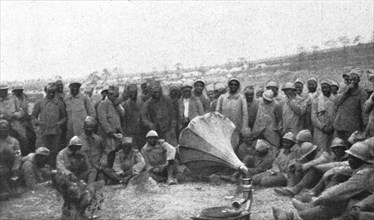 'La Bataille de la Somme; La prise de la Maisonnette: les Senegalais autour d'un phonographe', 1916 Creator: Unknown.