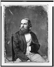 Unidentified man, about 40 years of age, three-quarter length portrait..., between 1844 and 1860. Creator: Mathew Brady.