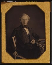 William Young McAllister, three-quarters length portrait, seated in a..., between 1848 and 1851. Creator: Marcus Aurelius Root.