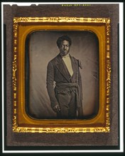 Chancy Brown, three-quarter length portrait, facing front, between 1856 and 1858. Creator: Augustus Washington.