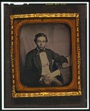 Alfred Francis Russell, three-quarter length portrait, full face, seated..., between 1856 and 1858. Creator: Augustus Washington.