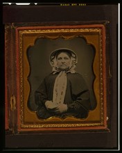 Unidentified woman, half-length portrait, wearing gloves, between 1840 and 1860. Creator: Unknown.