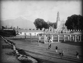 Popocatepetl from the plaza, Amecameca, between 1880 and 1897. Creator: William H. Jackson.
