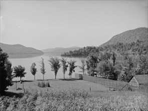 Lake and Rogers' Rock from the north, Lake George, N.Y., The, c1904. Creator: Unknown.