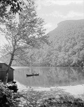 Profile Lake and Old Man of the Mountain, White Mts., N.H., between 1900 and 1920. Creator: Unknown.