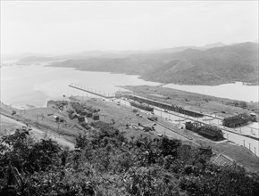 Pedro Miguel Locks, birdseye view, Panama Canal, between 1913 and 1920. Creator: Unknown.