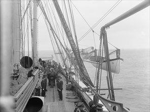 U.S.S. Hartford, inspection, looking aft., port side, between 1890 and 1901. Creator: Unknown.