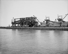 Clam shell ore unloading plant, Conneaut, Ohio, ca 1900. Creator: Unknown.