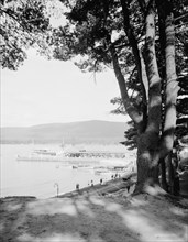 Fort William Henry Hotel, the old pine and the steamer landing, Lake George, N.Y., c1910-1920. Creator: Unknown.