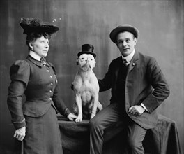 Mr. and Mrs. Frank Kern and trained dog Bobbie, between 1900 and 1910. Creator: Unknown.