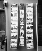 Wire postcard display rack, between 1900 and 1910. Creator: Unknown.