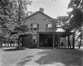 Exterior view of house, end view, Mrs. Robert Hoe, Jr., Port Washington, N.Y., between 1900 and 1910 Creator: Unknown.