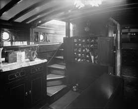 Yacht Althea, cabin showing buffet, between 1907 and 1915. Creator: Unknown.