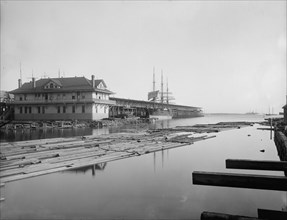 Wharf office and Commandancia Street wharf, Pensacola, Fla., between 1900 and 1905. Creator: Unknown.