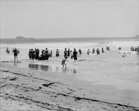 Surf bathing at Easton's Beach, Newport, R.I., between 1900 and 1905. Creator: Unknown.