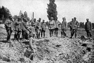 'les premieres operations Italiennes; le premier entonnoir creuse par un 305 autrichien', 1915. Creator: Unknown.
