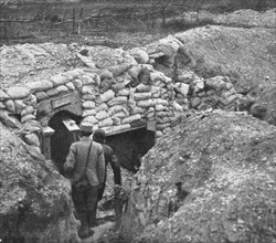'Derriere L'ennemi refoule; Entrée d'un abri, dans une tranchee allemande ligne', 1915 (1924). Creator: Unknown.