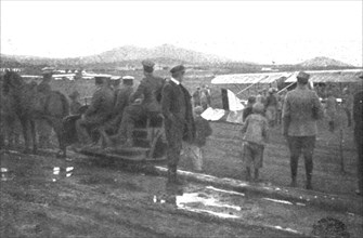 'Les premiers contingents Franco-Anglais a Salonique; Au camp d'aviation francais de...1915 (1924). Creator: Unknown.