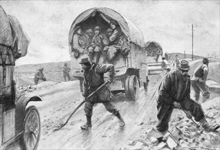 'A L'arriere de Verdun; Sur la route de Bar a Verdun, le passage continu des..., 1916 (1924) Creator: Georges Bertin Scott.