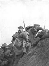 'Pendant l'action; Nos hommes quittent les tranchees de depart pour se lancer a..., 1916 (1924) Creator: Unknown.