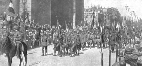 'Le jour de gloire; le drapeau de l'armee coloniale sous l'Arc de Triomphe', 1919. Creator: Unknown.