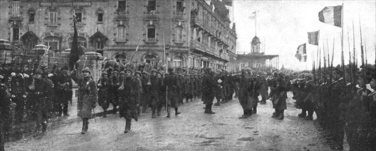'Le deuxieme anniversaire de L'Yser; le defile du 12e de ligne belge, son glorieux..., 1916. Creator: Unknown.