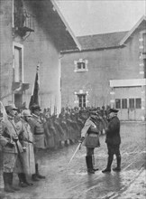 'M. Poincare a Verdun; le general Mangin, salue de l'epee le President de la Republique qui..., 1916 Creator: Unknown.