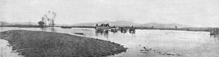 'Sur la route de Monastir; une route inondee dans la plaine au Sud de Kenali', 1916. Creator: Unknown.