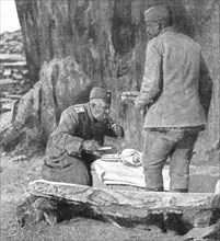 'Le commandant d'une des plus fameuses divisions serbes, dejeunant pres de son poste..., 1916. Creator: Vladimir Betzitch.