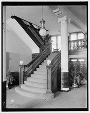 E.M. Bigsby Co. show rooms, stairway to the balcony, between 1900 and 1915. Creator: Unknown.