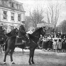 'Notre entrée a Colmar; Le general de Castelnau devant les drapeaux de la 169e division..., 1918. Creator: Unknown.