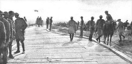 ''En Champagne; La route de Somme-Py a Souain, que l'ennemi avait sauter, refaite a l'aide..., 1918. Creator: Unknown.