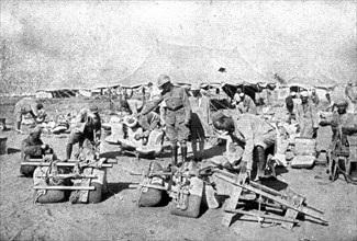 ''La Turquie Succombe; L'inspection des selles des chameaux employes aux transports', 1918. Creator: Unknown.
