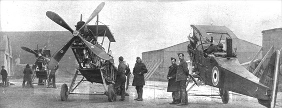 ''Combat Aerien; Parmi les forces alliees aerienes; Montage d'areoplanes repares dans un..., 1917-18 Creator: Unknown.