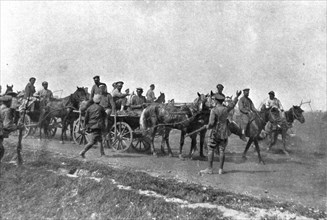 'Les Fuyards; Officiers russes et anglais des automobiles blindees arretant un convoi de..., 1917. Creator: Unknown.