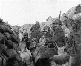 Life in the trenches in Champagne; Calm: "le pinard"', 1917. Creator: Unknown.