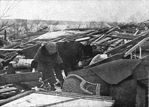 In Canada: The Halifax Explosion; People search among the ruins of their houses, 1917. Creator: Unknown.