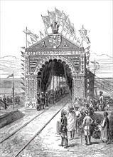 Triumphal Arch on the Alexandra Railway Bridge at Wuzeerabad...1876. Creator: Unknown.