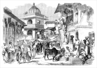 The Bazaar, Oodipoor, Rajpootana - from a drawing by W. Carpenter Jun., 1858. Creator: Unknown.