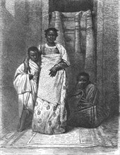 'A Madegasse women and her Children; A Birds-eye View of Madagascar', 1875. Creator: M.D Charnay.