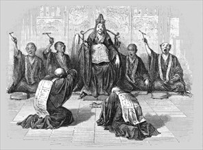 'Buddhist high-priest worshipped by his subordinates; A European Sojourn in Japan', 1875. Creator: Unknown.