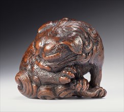 Chinese Lion Chewing Its Paw, First half of 19th century. Creator: Tadatoshi.