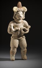 Dancer with Snakes, 1000-500 BCE. Creator: Unknown.