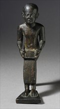 Seated Figure of the God Imhotep Holding a Scroll, 712-332 B.C. or later. Creator: Unknown.