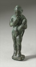 Figurine of a Standing Naked Man Holding a Baby, Ptolemaic Period-early Roman Period 200 BCE-100 CE. Creator: Unknown.