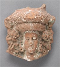 Antefix in the Form of a Female Head, Ptolemaic Period-Roman Period (305 BCE-337 CE). Creator: Unknown.